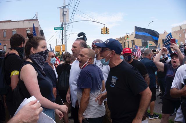 Pro-cop protesters yell at a counter-protester in Brooklyn on July 11th, 2020.